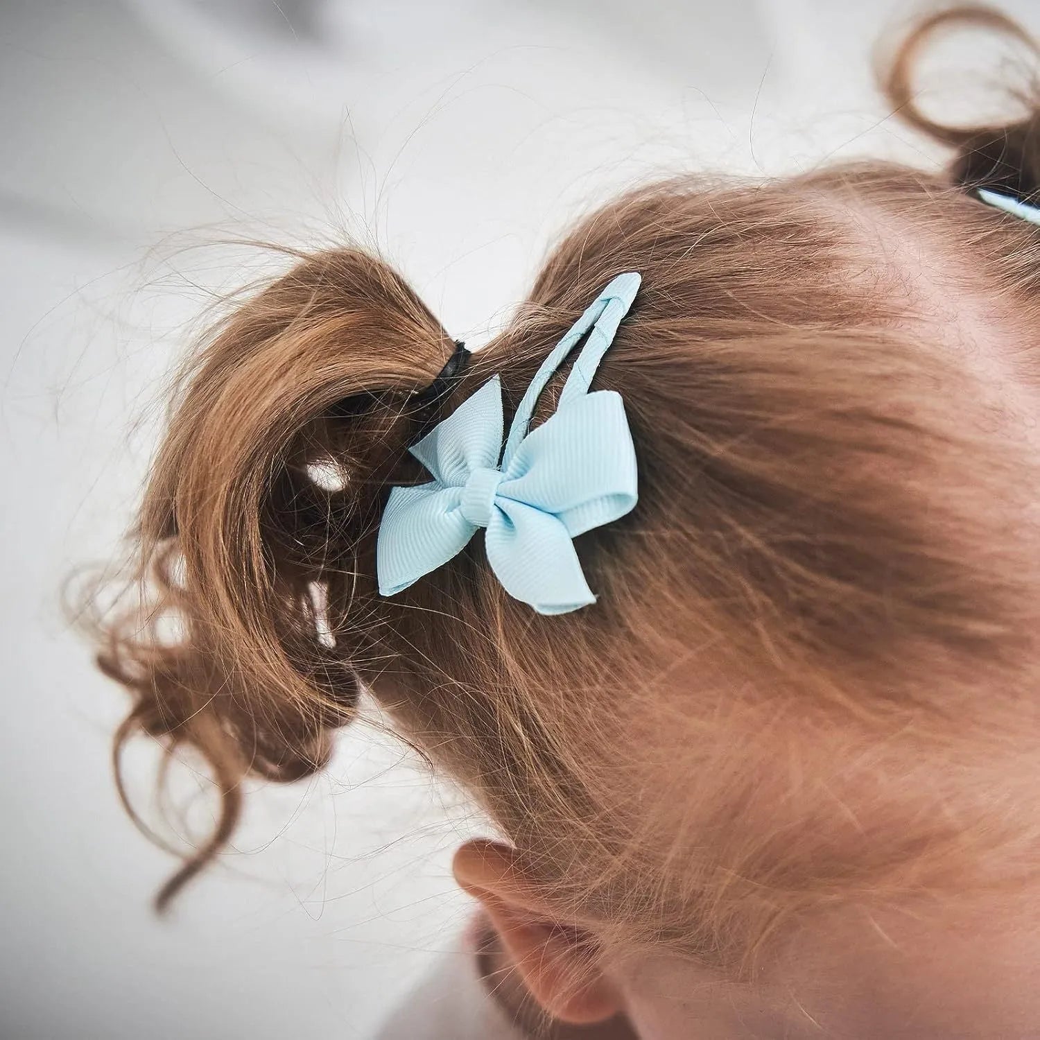 40-piece set of solid-colour grosgrain ribbon baby hair bows with wrapped metal snap clips.