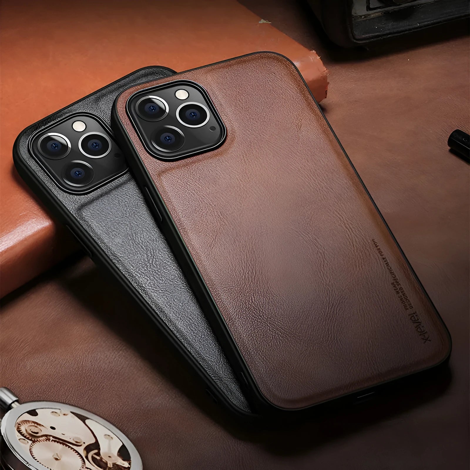 Black business leather phone case for iPhone 12 with PU leather and TPU frame on a wooden desk.