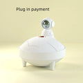 Astronaut sunset lamp humidifier in white with 360-degree rotating head and mist from single fog outlet