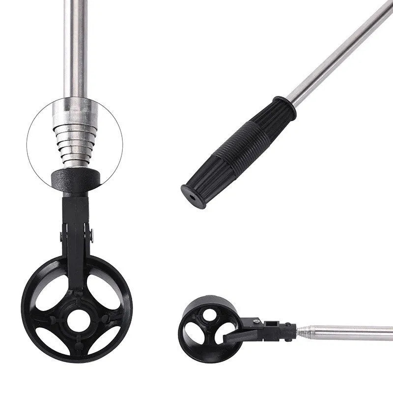 Black stainless steel retractable golf ball retriever with plastic head on golf course