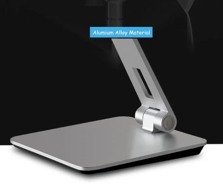 Folding aluminium phone and tablet stand with black silicone pads, shown holding a tablet at an angle.