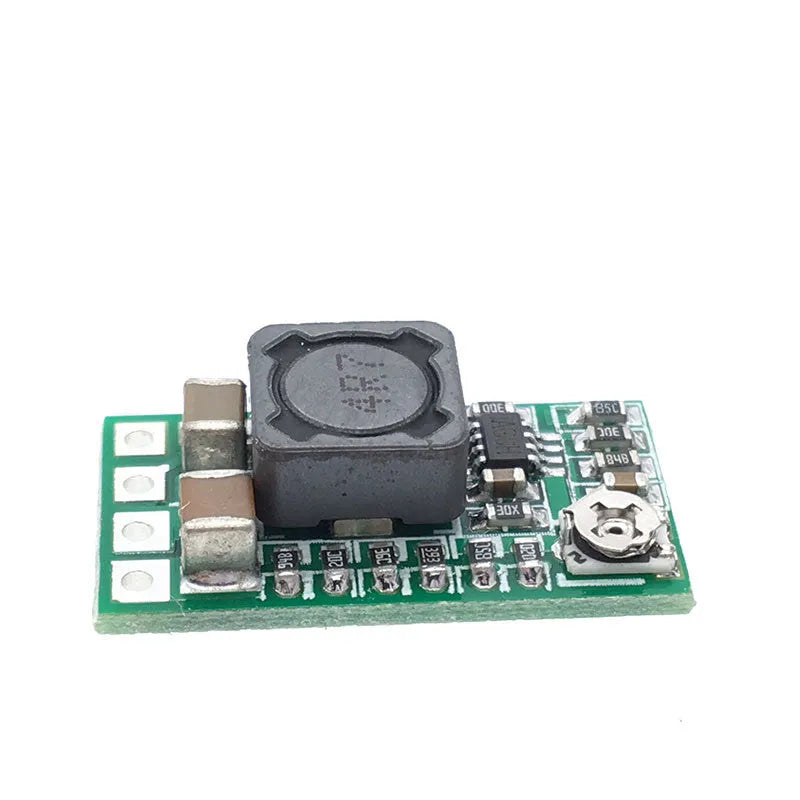 Green circuit board DC-DC power module converting 12-24V to 5V with 3A output capacity