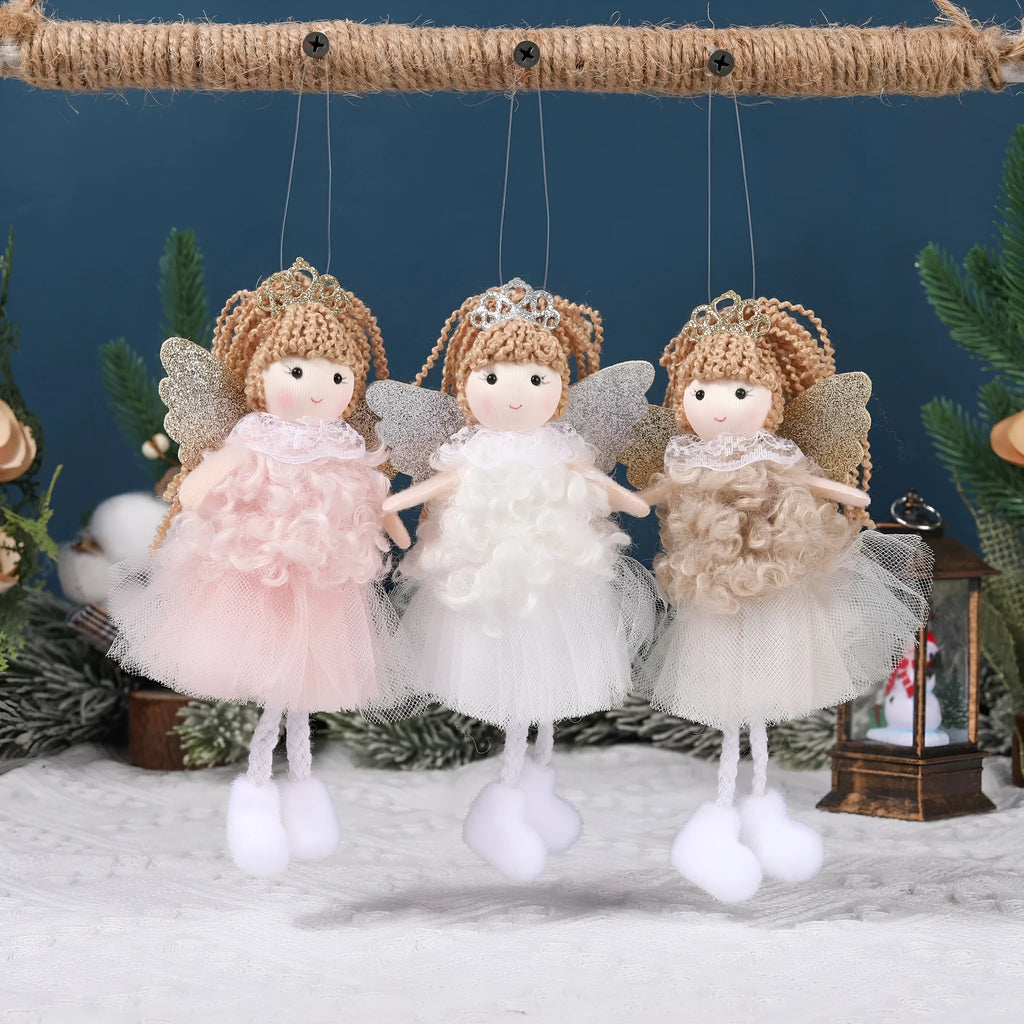 Cartoon angel cloth hair clip for a girl's Christmas ponytail in khaki, pink, or white.