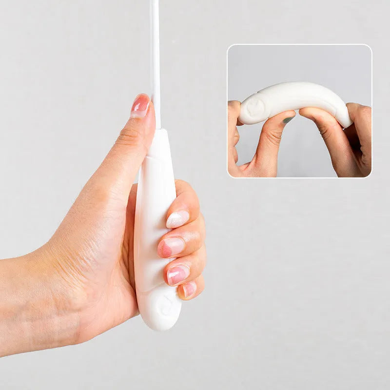 White telescopic cat fishing rod extended with goose feather lure and removable pen attachment