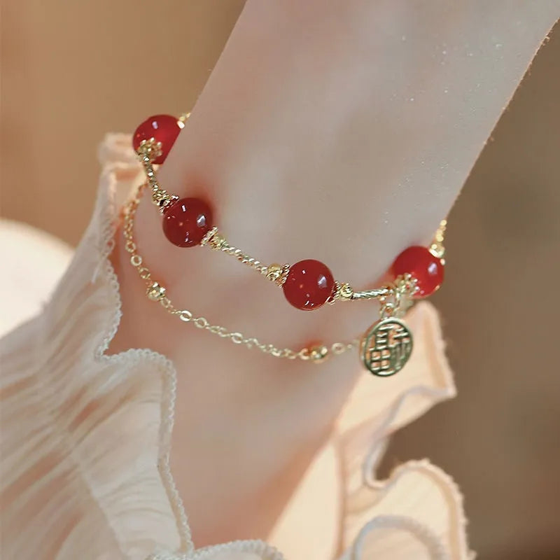 Women's double-layer alloy bracelet with a red agate blessing card charm and horse motif