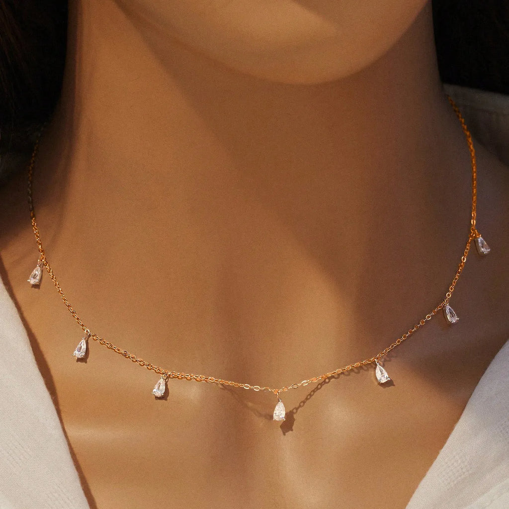 925 silver drop-shaped artificial zircon necklace on an adjustable O-chain, shown in silver, rose gold, and golden yellow finishes.