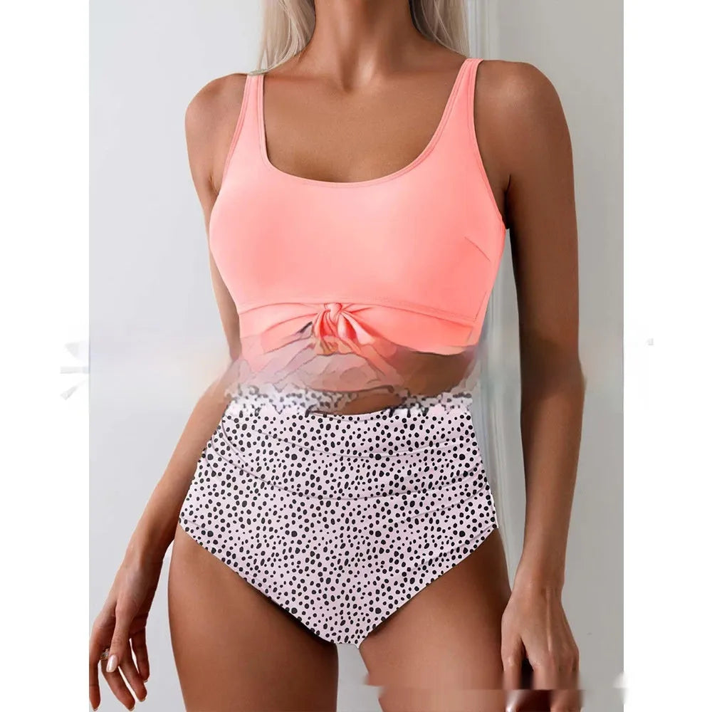 One-piece female swimsuit with contrast colour straps and covered belly in Rose-Red + Black colour option