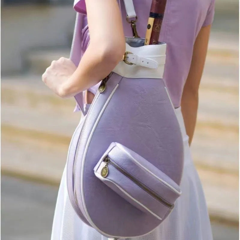 Retro-style leather badminton bag for women with a single shoulder strap, shown in a selection of colours.