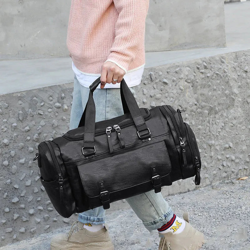 Large black PU travel bag with dimensions 52cm wide, open to show interior for shoe storage.