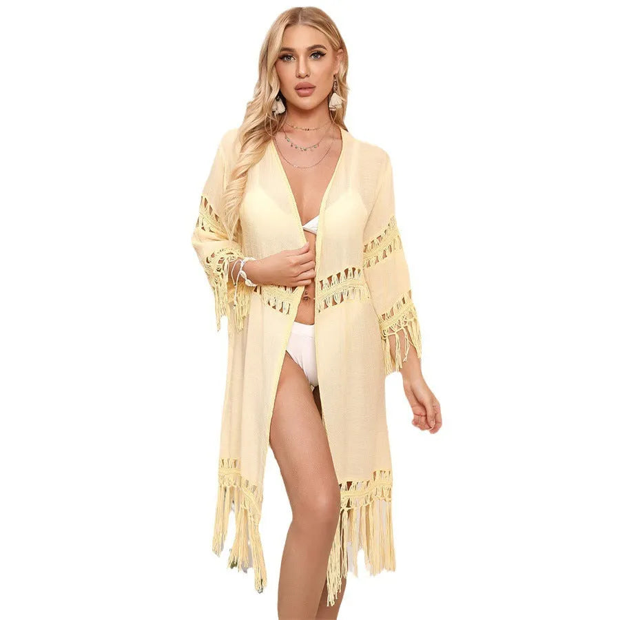 Women's hand-crocheted acrylic beach cardigan with tassel detailing in water green colour
