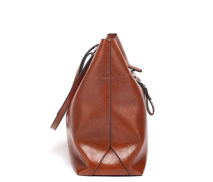 Brown leather crossbody handbag with multiple internal compartments showing dimensions 30cm wide by 37cm high.