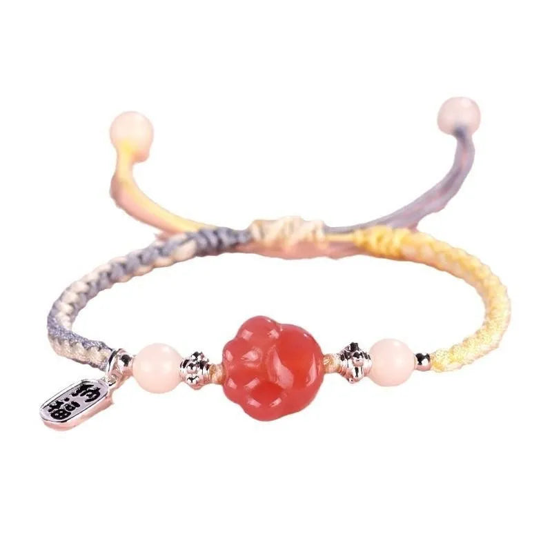 Handmade red cat's paw charm bracelet with woven band in pink or yellow colour for couples
