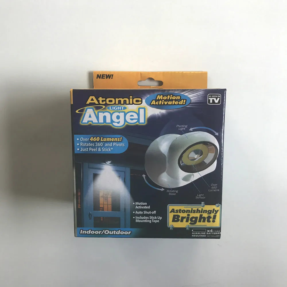 White Atomic Angel induction lamp with ABS plastic construction and 13.3cm dimensions