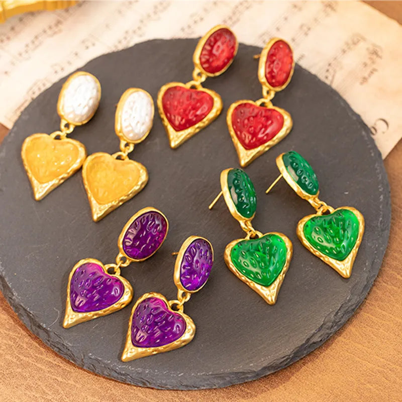 Oval love heart stud earrings with silver needle pleating in four colour options