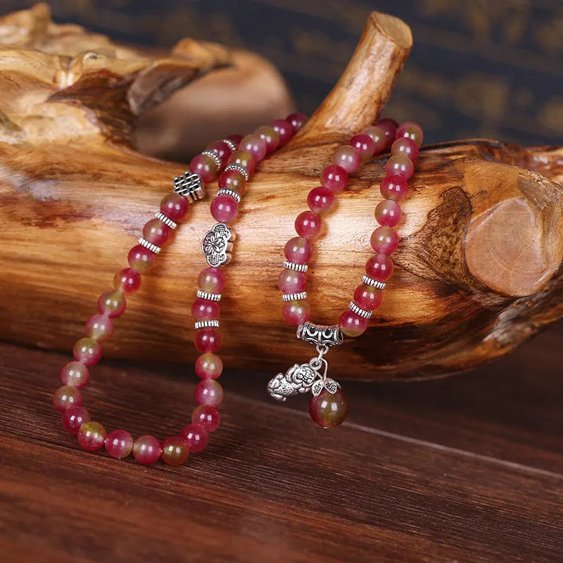 Handmade natural watermelon crystal bracelet with Chinese knot design and geometric beads in elephant style colours