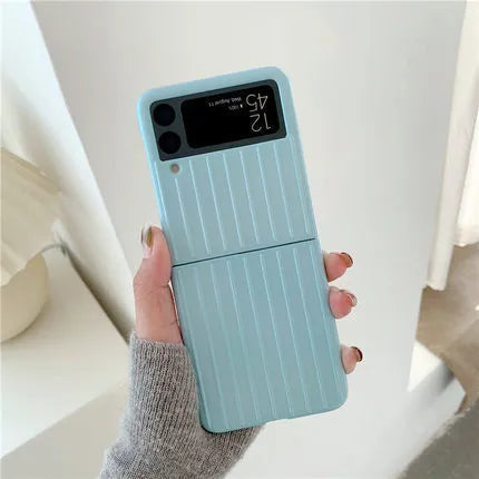 Samsung Z Flip3 flip-type mobile phone case in a choice of seven solid colours showing ultra-thin design.