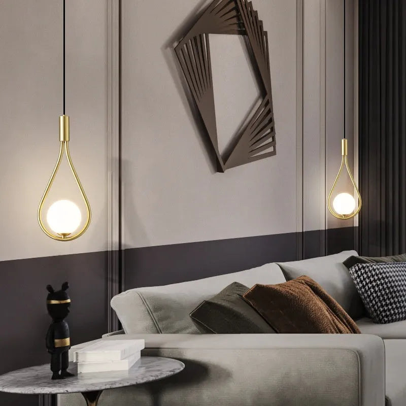 Modern minimalist copper bedside chandelier with a choice of three shade colours and a tricolour light source.