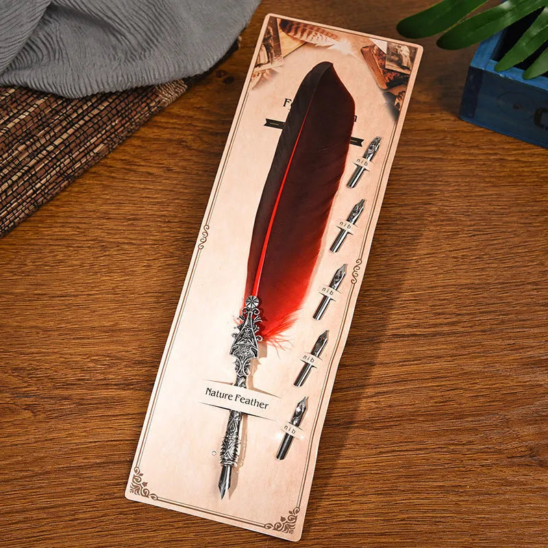 Retro zinc alloy feather dip pen in choice of ten colours on a desk.