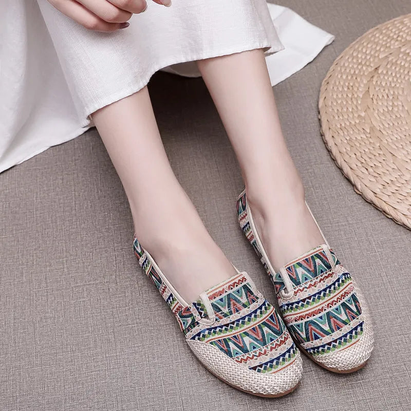 Women's ethnic style cloth shoes with colour stitching, cotton lining, and flat heel in shallow mouth design