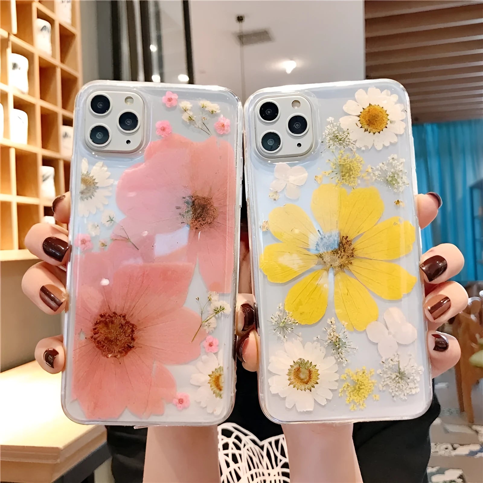Floral TPU phone case with large flower pattern, available in pink and yellow versions, showing back cover design for iPhones