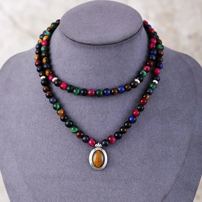 Tiger eye necklace and bracelet set with crown, infinity, and heart pendants on ball bead chain