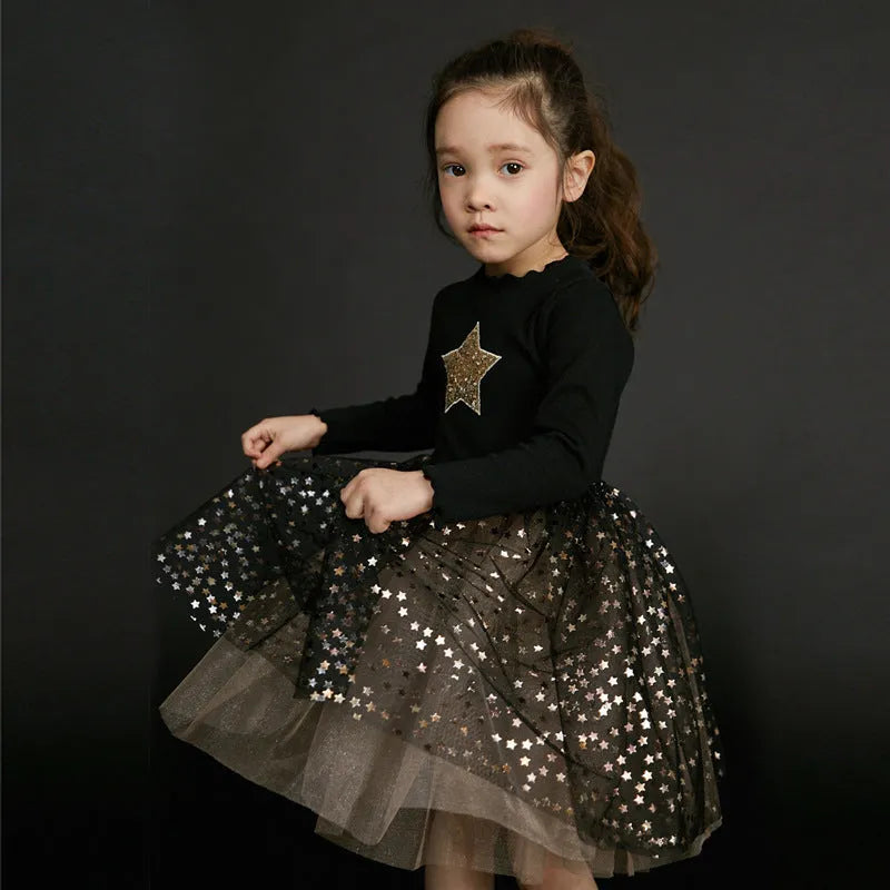 Children's red cotton Christmas princess dress with long sleeves, lace trim, and embroidered star details.