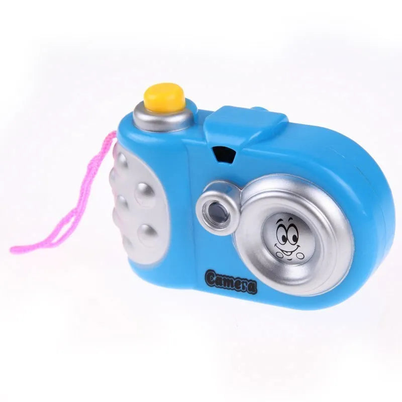 Kids educational projection camera toy showing dinosaur and dolphin images with slide switch mechanism in blue or pink colour