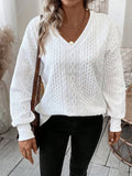 Milky white loose fit long sleeve T-shirt with a 3D pattern, casual pullover style.