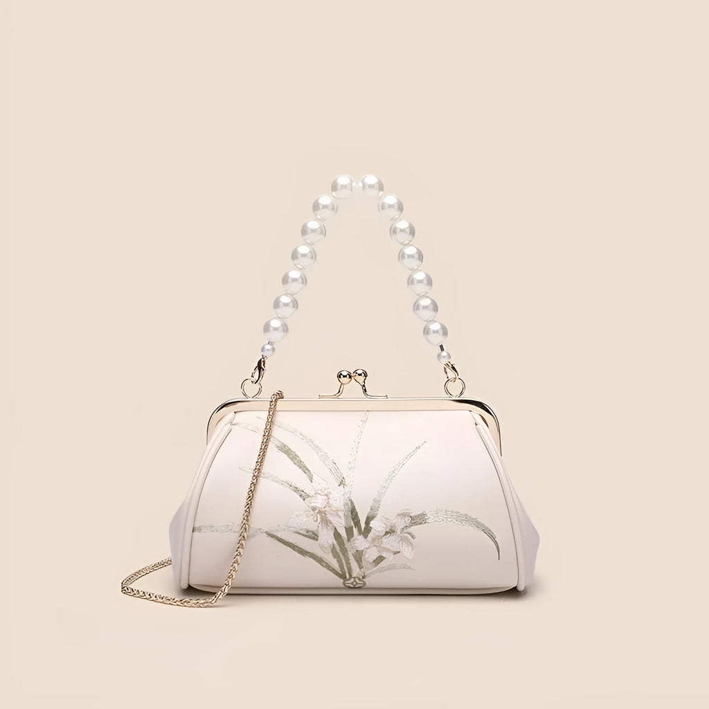 Beige women's shoulder bag with floral embroidery on soft PU leather material