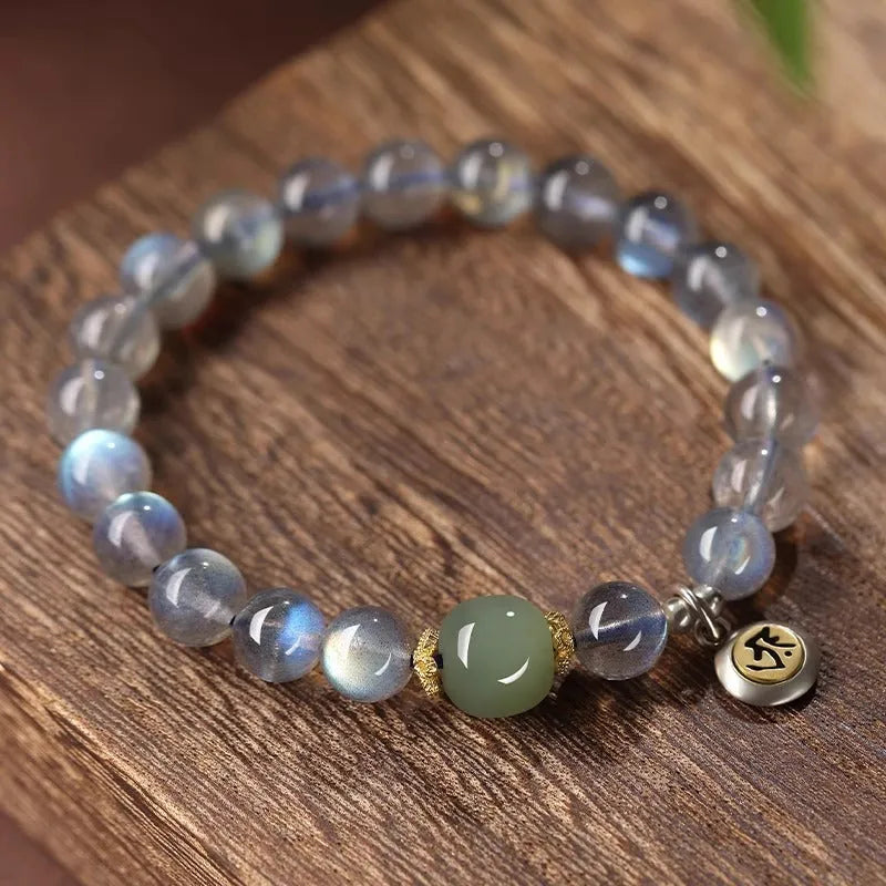 Moonstone Buddha beads bracelet with electroplated Guanyin mouse design on 8mm crystal bead