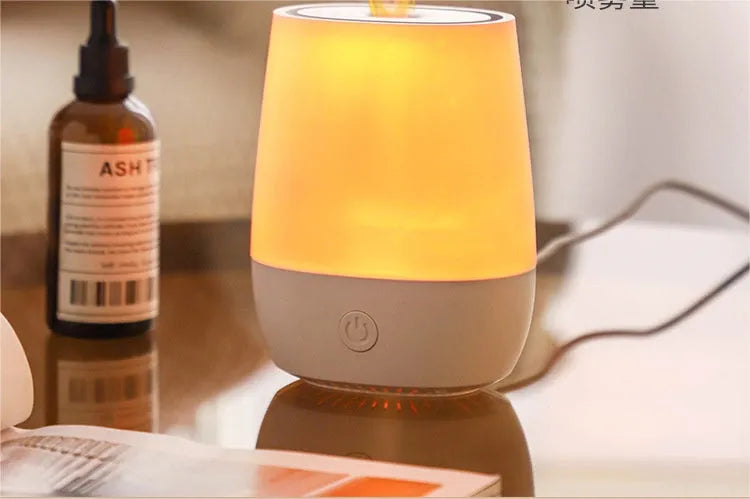 White USB aroma diffuser with flame effect lighting and water tank for essential oils