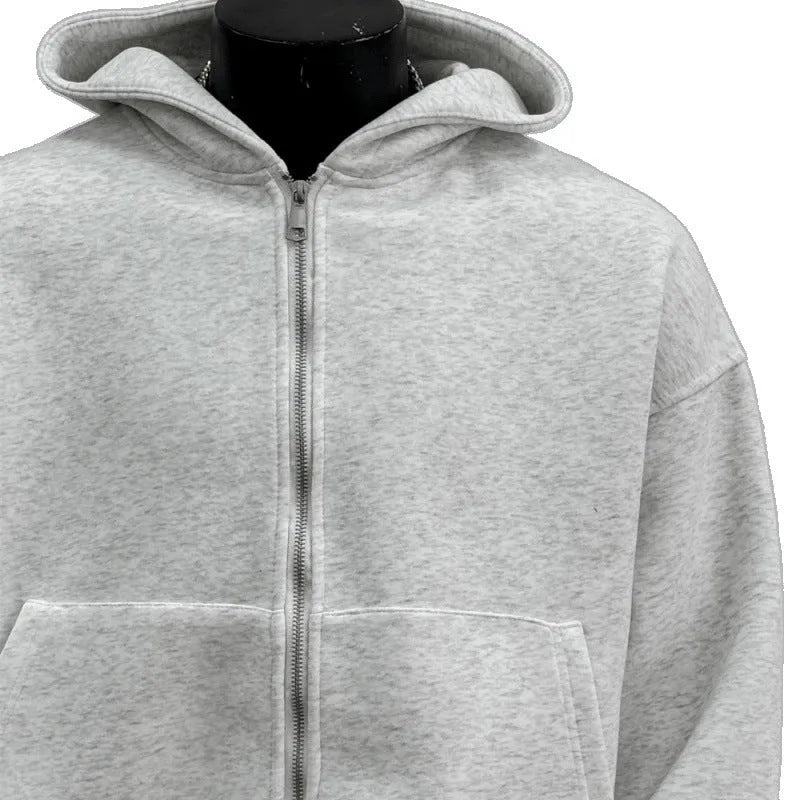 Light grey men's hoodie with backpack-style design on back, featuring a hood.