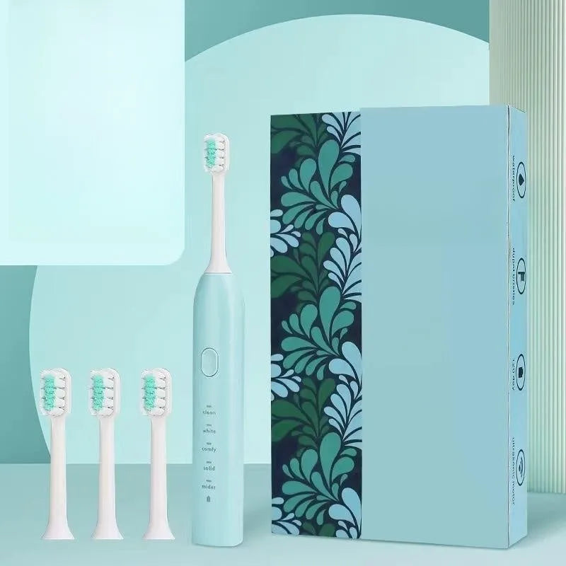 Yellow rechargeable electric toothbrush with small duck design, soft bristles, and USB charging port.