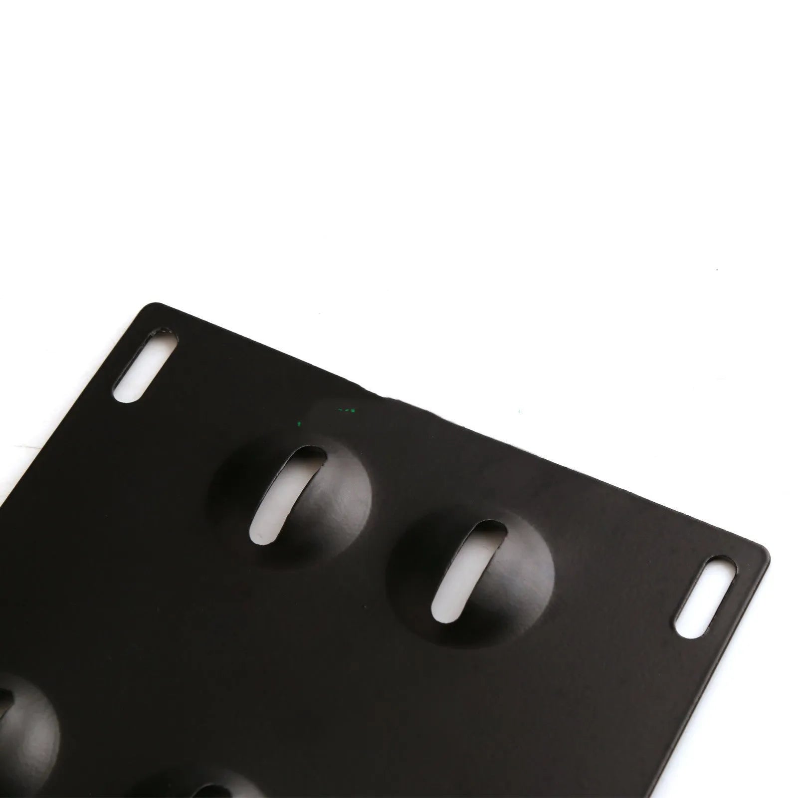 American-style metal licence plate frame with integrated trailer hook for vehicle modification