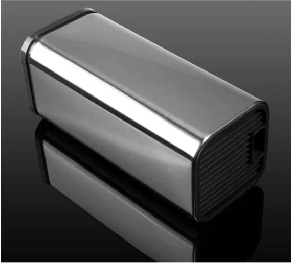 Black and white kitchen tool holder with stainless steel construction and detachable drainage base