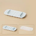 Food grade high-capacity ice cube tray with leverage handle and ice shovel in storage slot, shown in blue colour.