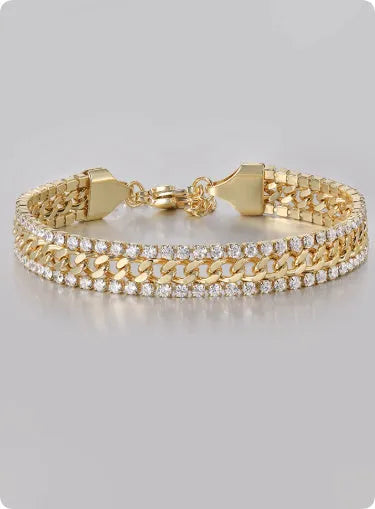 Gold-coloured titanium steel tennis bracelet with artificial gemstone inlay and a clasp.