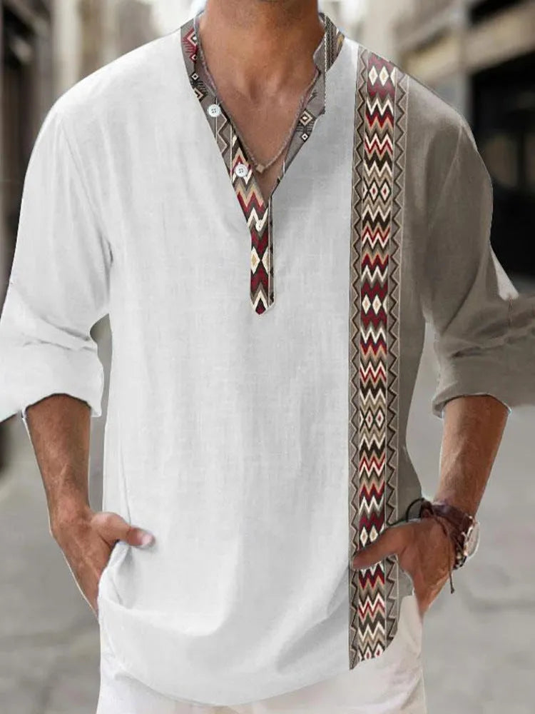 Long sleeve striped Hawaiian shirt in thin polyester fabric on a hanger.