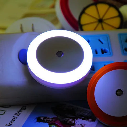 Round halo LED induction lamp showing blue, red, white, and yellow colour options for portable use.