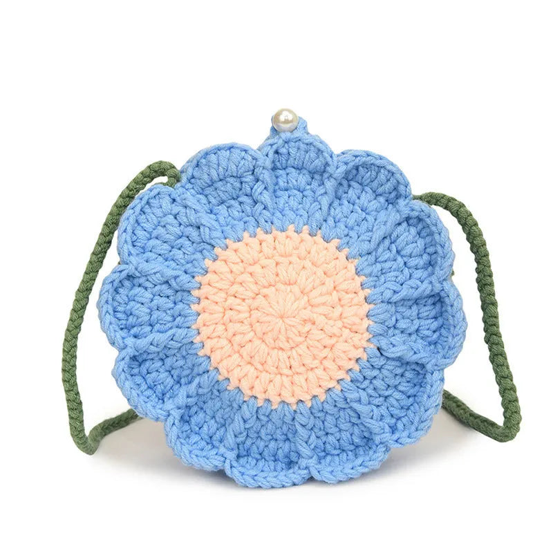 Hand-woven crochet shoulder bag with floral design, cotton lining, and internal phone pocket