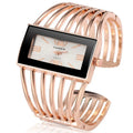 CANSNOW women's rose gold bangle bracelet watch with round white dial and quartz movement