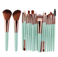 18-piece professional makeup brush set with fan-shaped contour and highlight brushes on a white background.