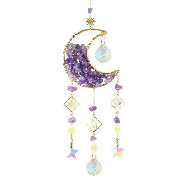 Car interior hanging pendant with large round crystal moon charm on a metal chain.