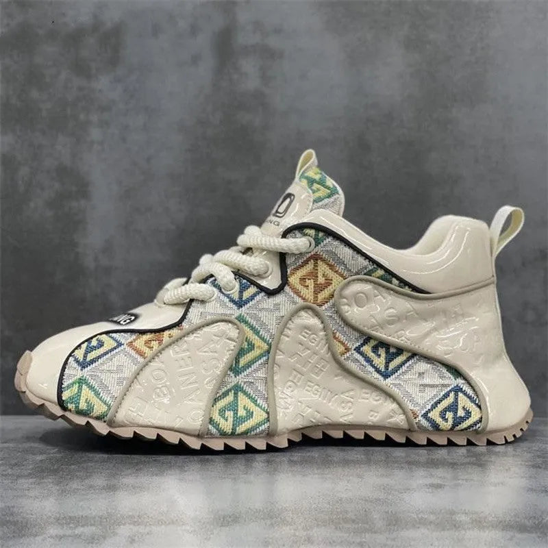 Men's beige platform casual shoes with embroidery detail on the PU upper and a rubber sole.