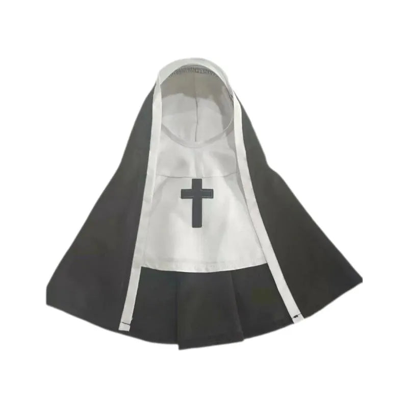 Black and white nun cloak costume on a small dog for Halloween.