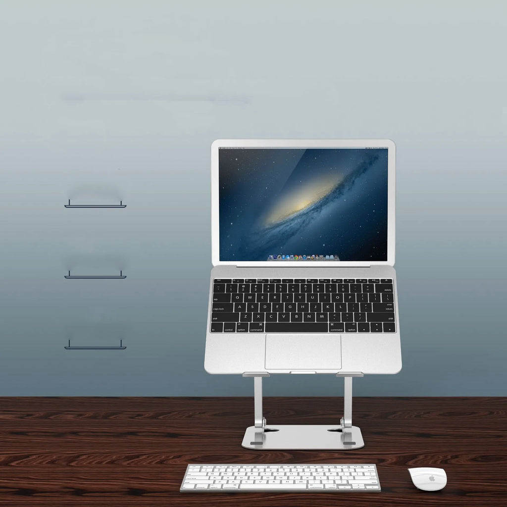 Silver aluminium alloy folding laptop cooling stand on a desk with a notebook placed on it