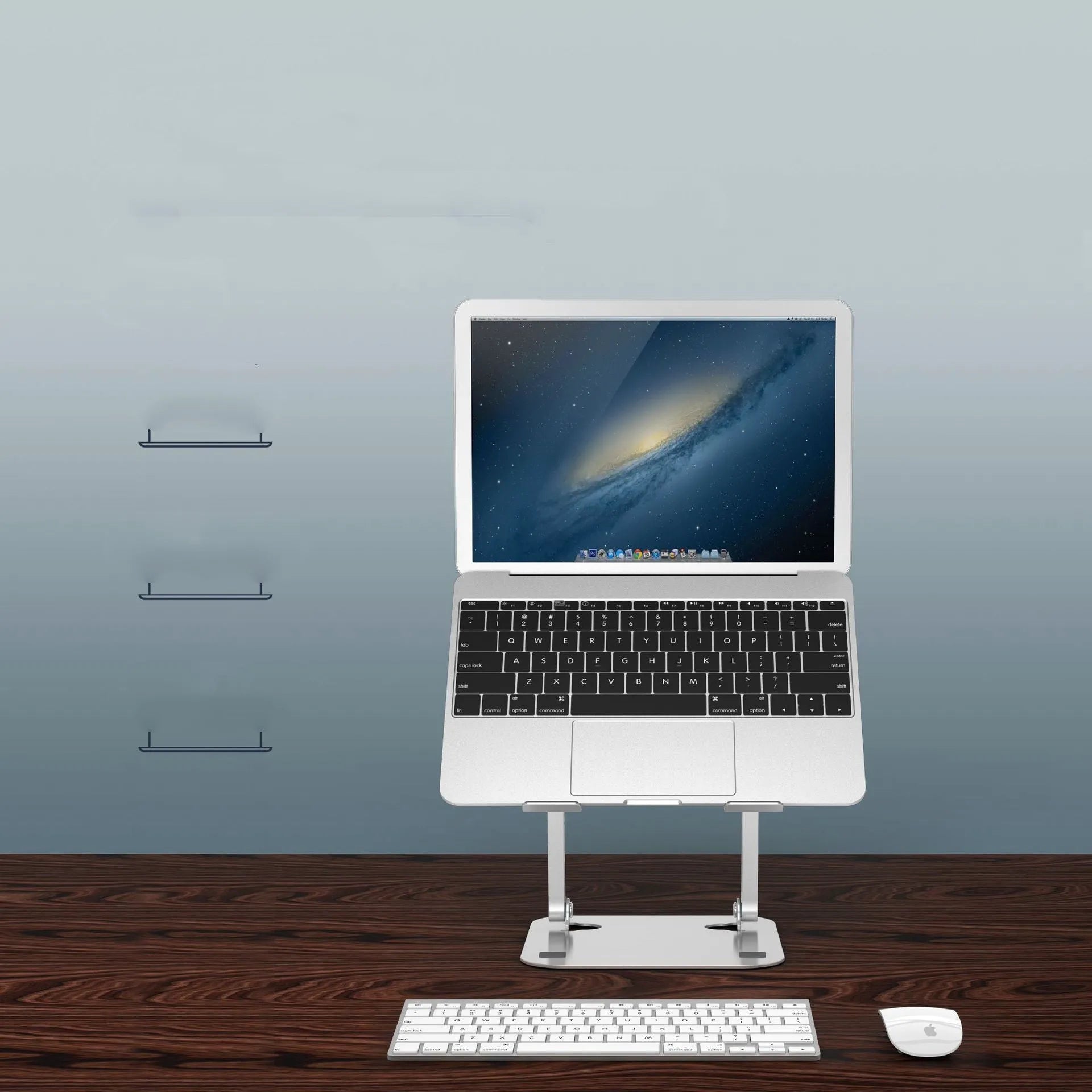 Silver aluminium alloy folding laptop cooling stand on a desk with a notebook placed on it