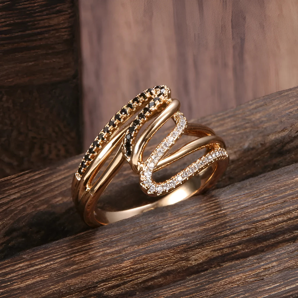Close-up of a women's copper ring with micro-inlaid zircon stones and a silver-toned electroplated finish.