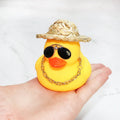 Yellow duck wearing straw hat car dashboard ornament with adhesive gel and sunglasses accessory