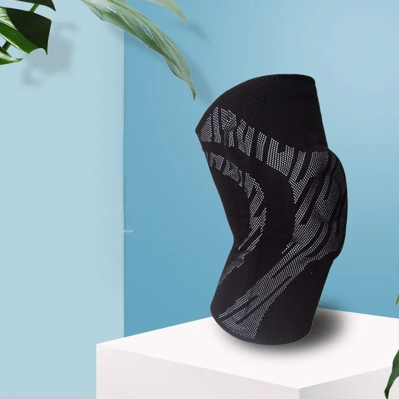 Men's black nylon basketball knee pad shown on a knee, size label visible.